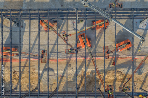 Workers constructing steel commercial building in Georgia