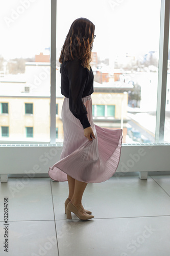 Woman gazing out a window