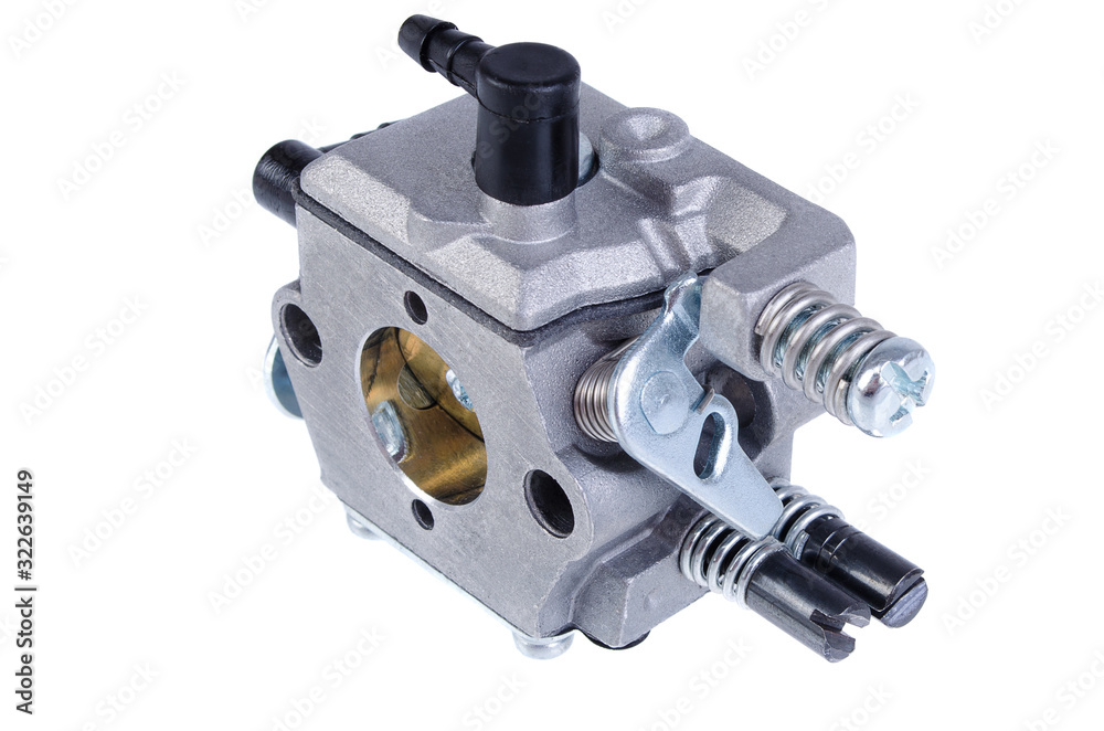 Chainsaw carburetor close-up on a white background Chainsaw carburetor close-up on a white background