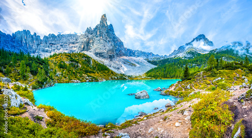 Valokuva Famous turquoise lake Sorapis with high mountains at sunset, Dolomites, Italy, E