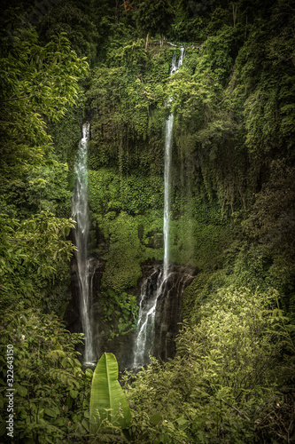 Beautiful Bali waterfall Sekumpul in tropical forest on Bali in Indonesia as famous landmark