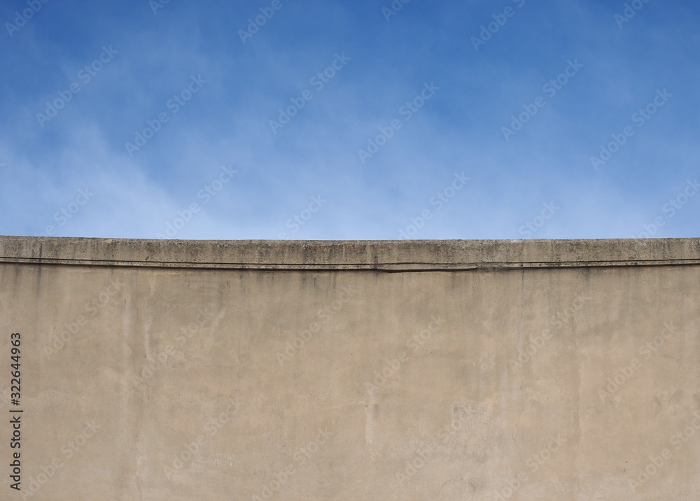 concrete wall and blue sky background concrete wall and blue sky background