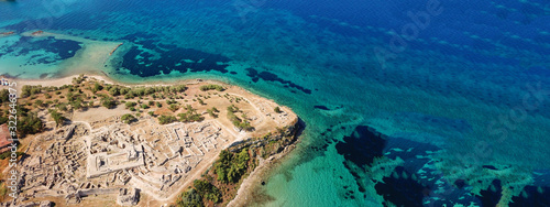 Aerial drone ultra wide top down photo of archaeological site of Temple of Apollo in island of Aegina, Greece