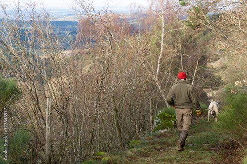 Man and Dog Following Scent Trail