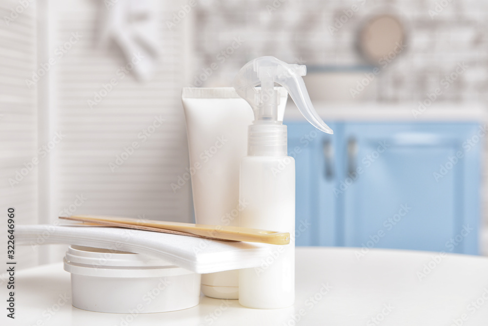 Sugaring paste for hair removal with cosmetics in bathroom Sugaring paste for hair removal with cosmetics in bathroom