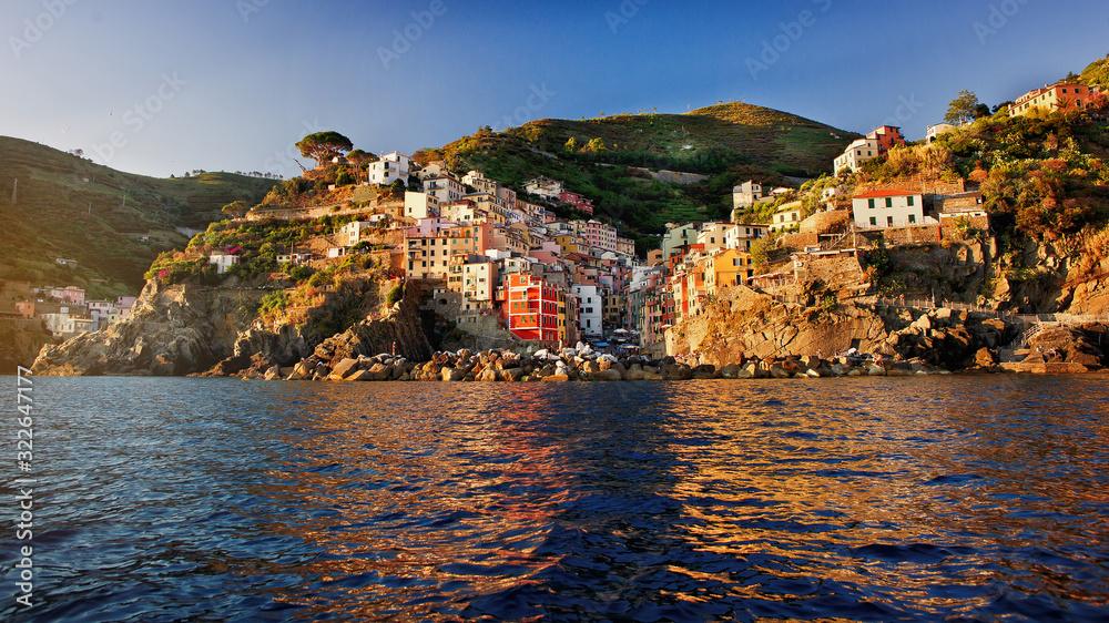 Beautiful view of the colorful house at sea. Riomaggiore - beautiful village in Cinque terre, Liguria, Italy.