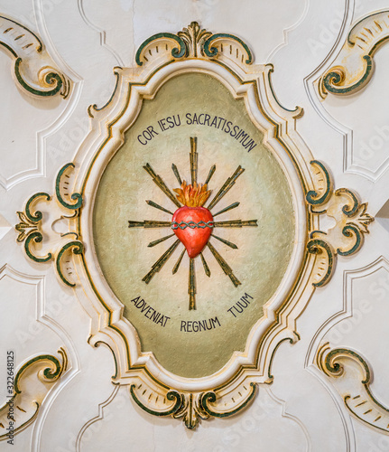 Jesus heart fresco from the ceiling of the Church of Santa Maria della Purità in Martina Franca, province of Taranto, Apulia, southern Italy. photo