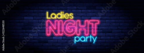 Ladies night party neon banner. Brightly illuminated neon sign. Neon lettering on brick wall background. Disco club event flyer template. Nightlife and entertainment signboard.