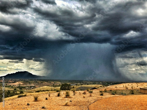 storm clouds over the mountains photo