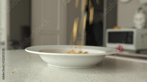 Wallpaper Mural Corn flakes falling into a plate, 4K Torontodigital.ca