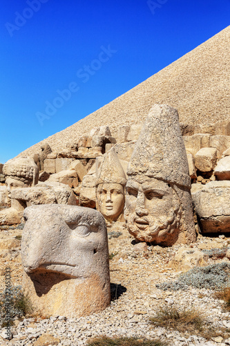 Ancient Commagene statue ruins on top of Mount Nemrut  Adiyaman  Turkey. Unesco World Heritage Site at Mount Nemrut where King Antiochus of Commagene is reputedly entombed.