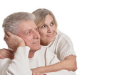 Portrait of happy senior couple on white background