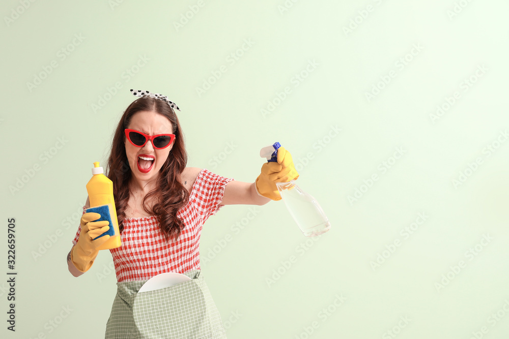 Funny housewife on color background Funny housewife on color background