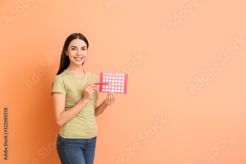 Young woman with menstrual ...