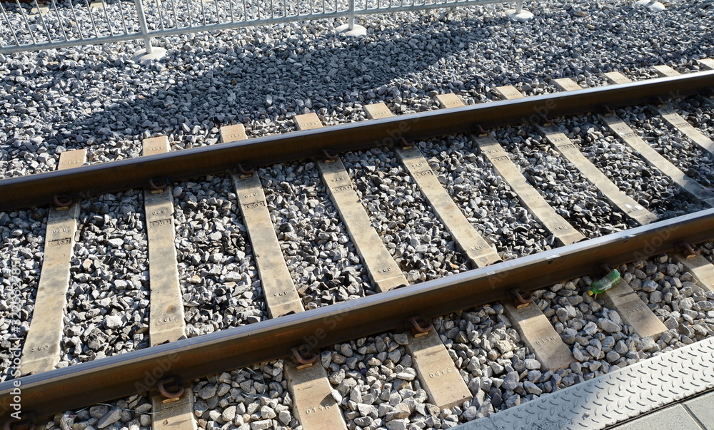 Autumn view of the outgoing railway. Railway or railroad tracks for train transportation.