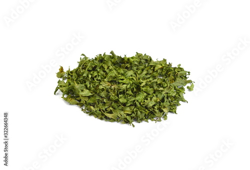 Spice dried celery pile isolated on white background. Green spice.