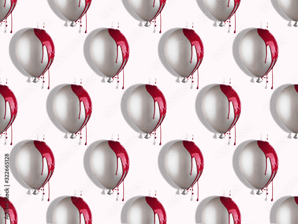 Grey balloons in red paint dripping. Creative pattern.