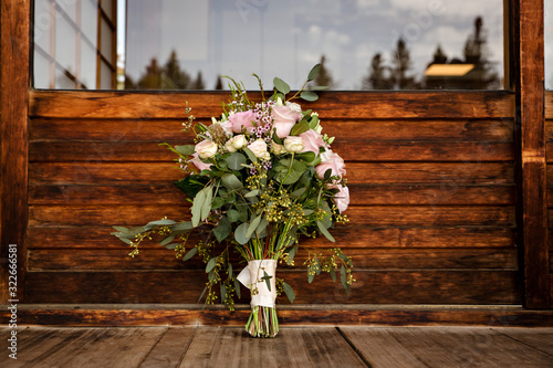 wedding bouquet against beautiful dark wood background