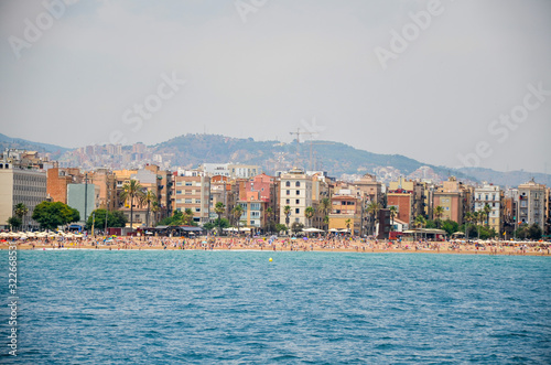 View of Barcelona from Mediterranean sea. Barceloneta beach and Port Olimpic, Catalonia, Spain © Dmytro