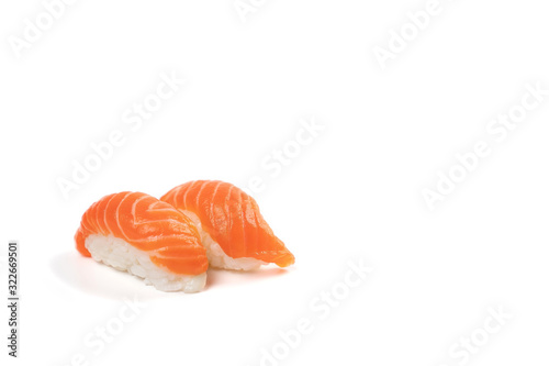 Sushi Salmon, The Japanese traditional food rice ball with fresh salmon fish slice on top. On white clear background with studio light. Clipping path.