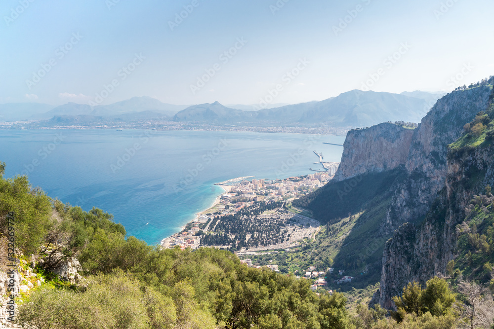 Panoramic view on the sea with cityscape from statue of Santa Rosalia on Monte Pellegrino on a beautiful sunny day - Palermo, Sicily.
