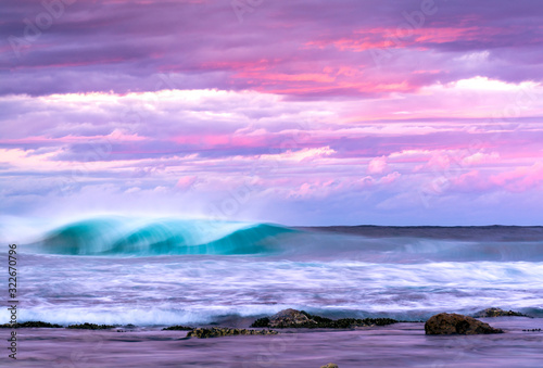 Motion blur photo of a wave at sunset, Sydney Australia