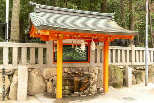 Water bath at Ikuta Inari shrine in Kobe, Japan photo