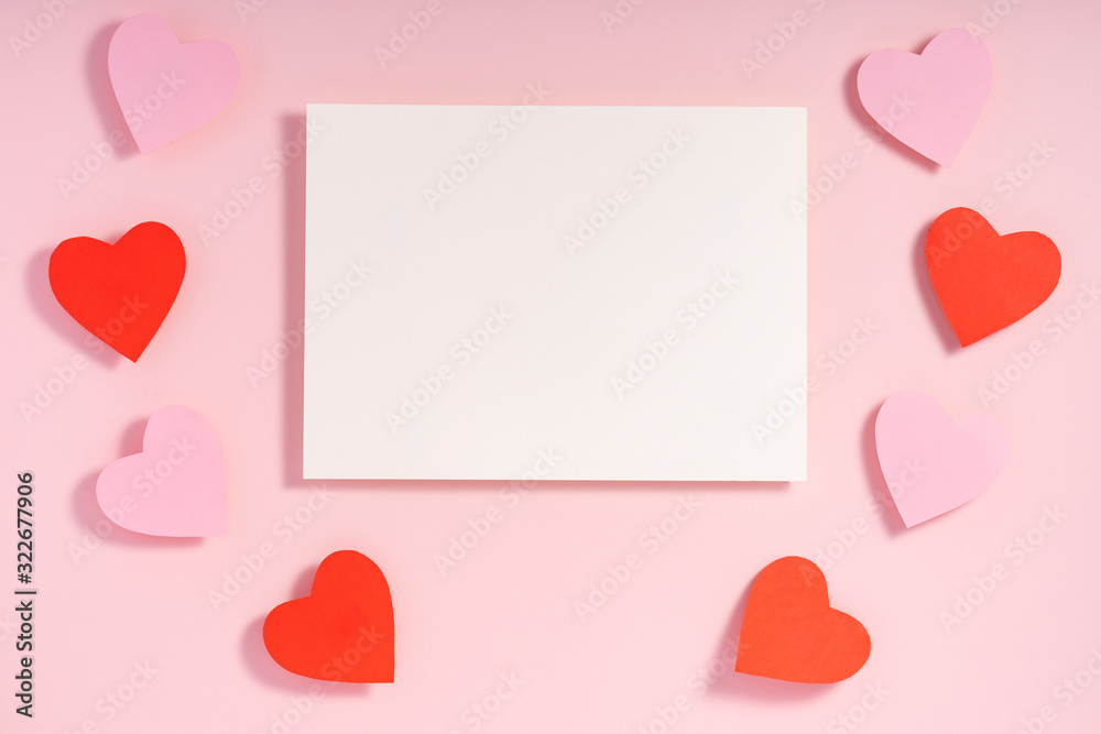 Valentine hearts with shadow, blank sheet of paper, template for design on pink surface Valentine hearts with shadow, blank sheet of paper, template for design on pink surface