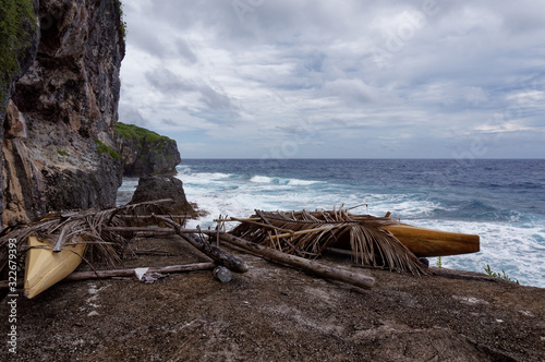 Fotografie Outrigger canoes on the south Pacific tropical island of Niue.