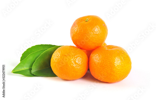 Small orange with leaf isolated on white background. Mandarin orange. Tangerines orange with leaf.