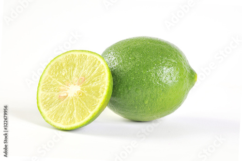 Sliced fresh lime isolated on white background