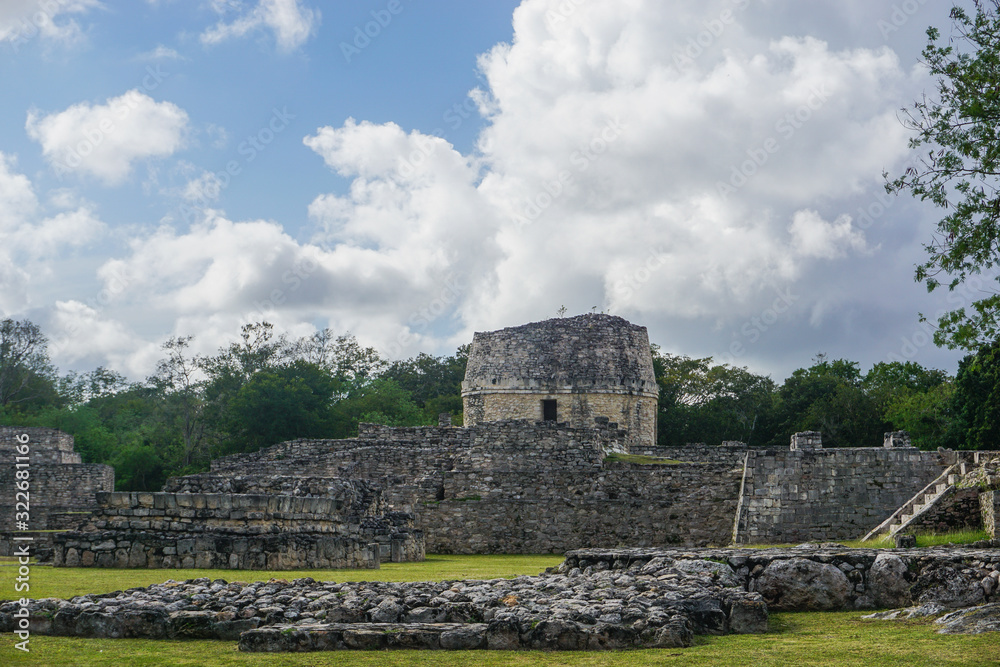 Mayapan, Yucatan, Mexico: El Templo Redondo -- The Round Temple -- with other Mayan ruins in the foreground.