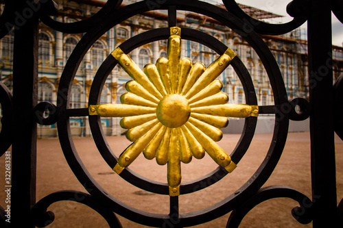 A gilded decoration on the gate to St Catherine's Palace near St Petersburg, Russia