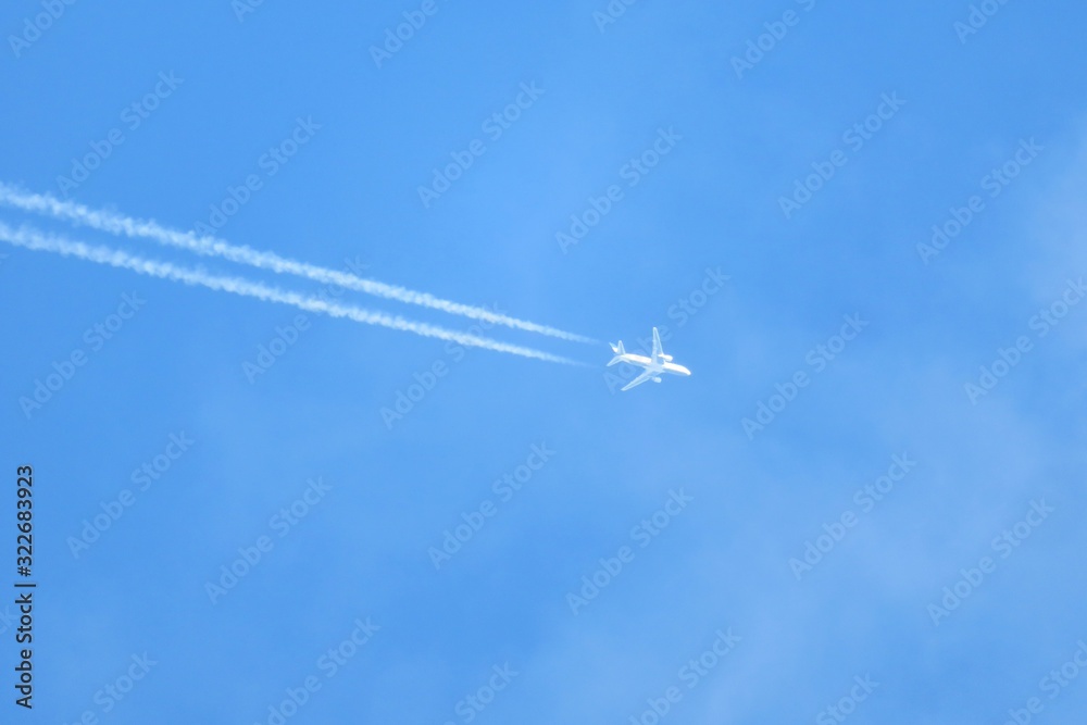 Airplane in blue sky background Airplane in blue sky background