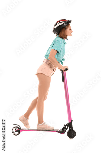 Teenage girl riding kick sc...