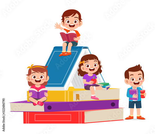 happy cute little kids boy and girl read book