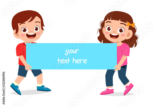 happy cute little kids boy and girl holding banner