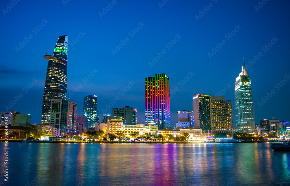 Night time scenery of District 1 Ho Chi Minh City, Vietnam, as seen from District 2 across Saigon River.