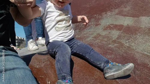 Wallpaper Mural Selfie video of happy dad with pretty and cheerful little daughter having fun outdoors and sliding down on playground Torontodigital.ca