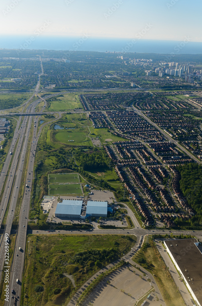 Aerial view of Mississauga Ontario on Lake Ontario with suburbs on highway 403