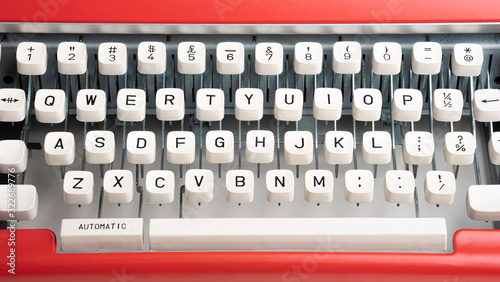 Portable Manual Typewriter In Red Orange