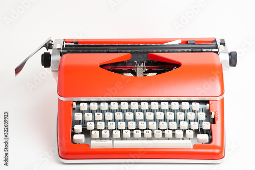 Portable Manual Typewriter In Red Orange