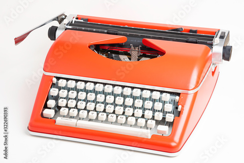 Portable Manual Typewriter In Red Orange