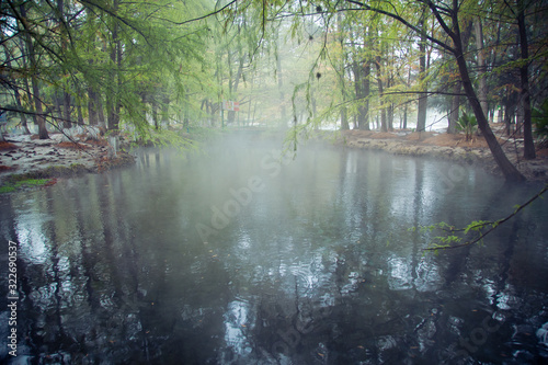 Thermal lagoon under deep sky , Blurred photo of morning fog over a lake in cold autumn weather in San Luis Potosi © @Nailotl