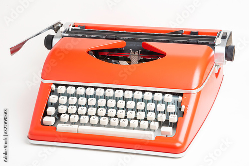 Obraz na plátně Portable Manual Typewriter In Red Orange