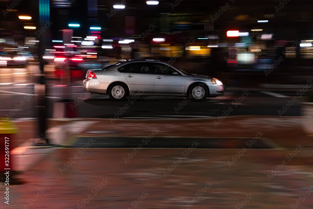 Silver Car Speeding Through Intersection Silver Car Speeding Through Intersection