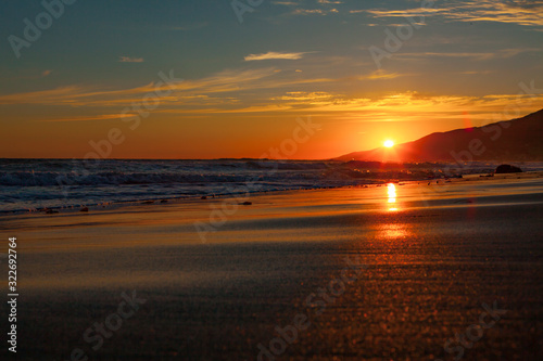 sunset on the beach © David