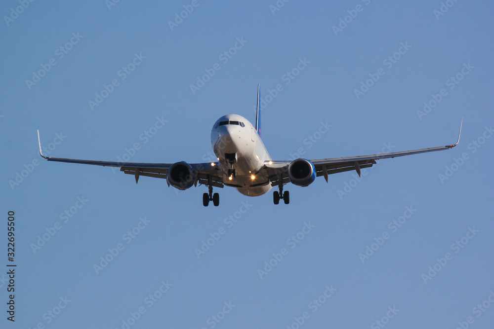 Civil aircraft close up landing on Runway Civil aircraft close up landing on Runway