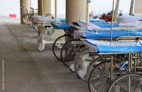 Fotografía Closeup of wheel-beds and stretchers in front of O