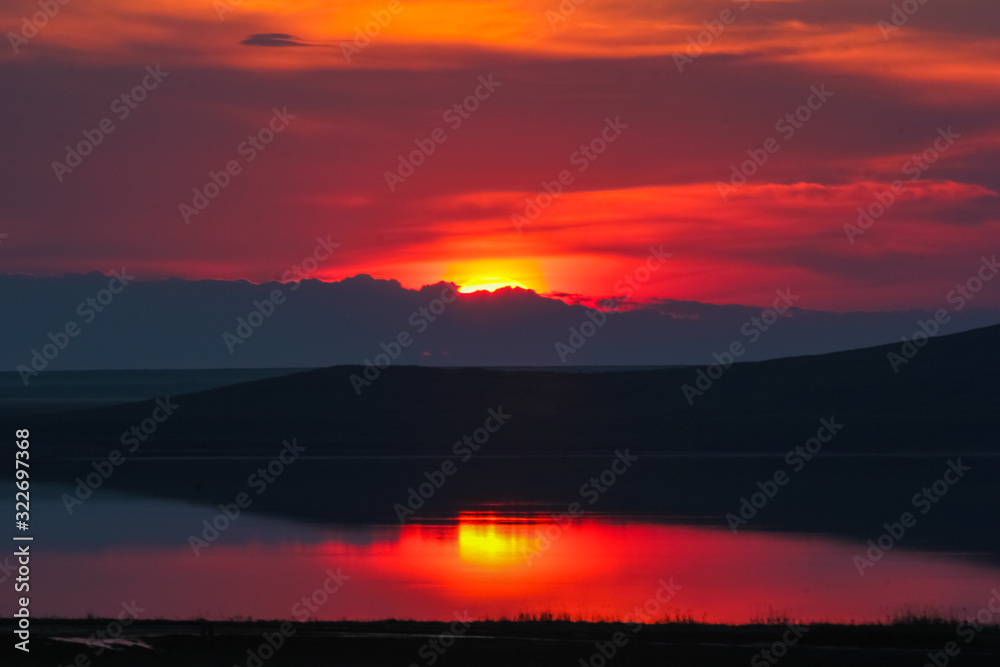 Incredible sunset on the lake Opuk, on the Black Sea, Crimea